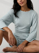 Light blue linen blend two-piece lounge set with cropped top and elastic waistband shorts for comfortable spring and summer wear