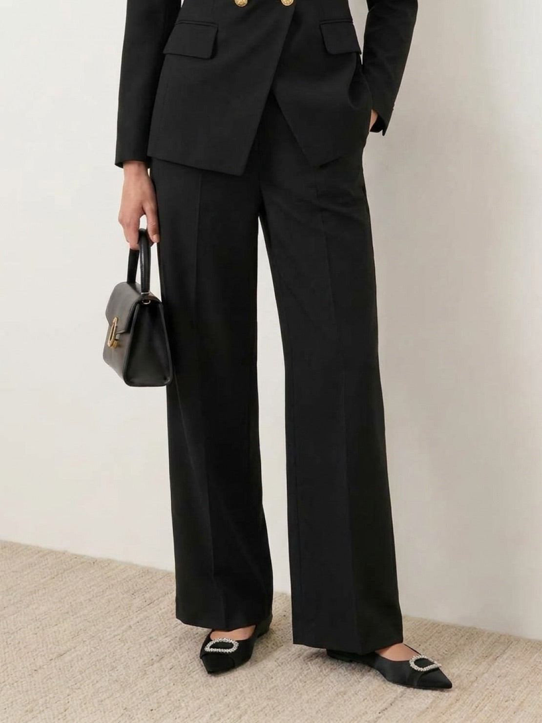 Structured double-breasted blazer with gold lion-head buttons and wide-leg trousers co-ord set