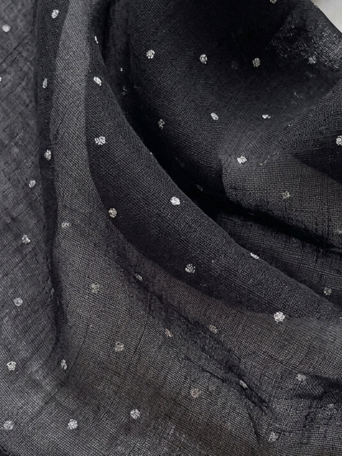 Lightweight 100% linen neck scarf with timeless checkered pattern and natural rolled edges for versatile styling