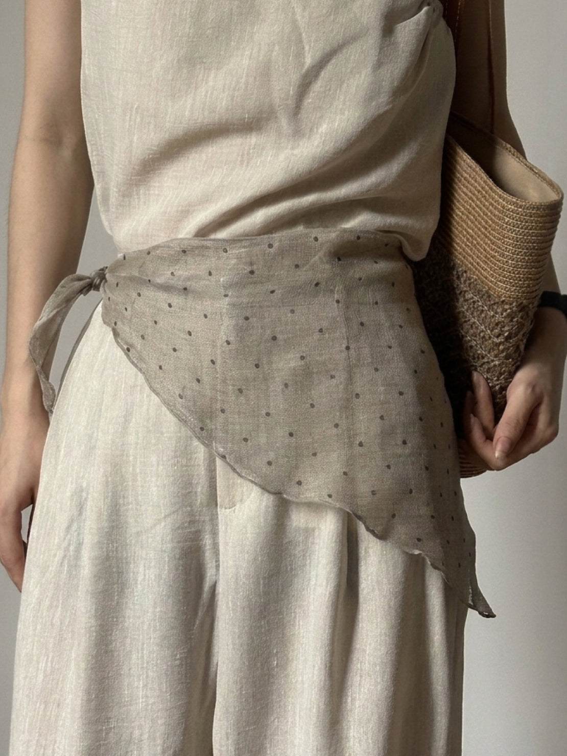 Lightweight 100% linen neck scarf with timeless checkered pattern and natural rolled edges