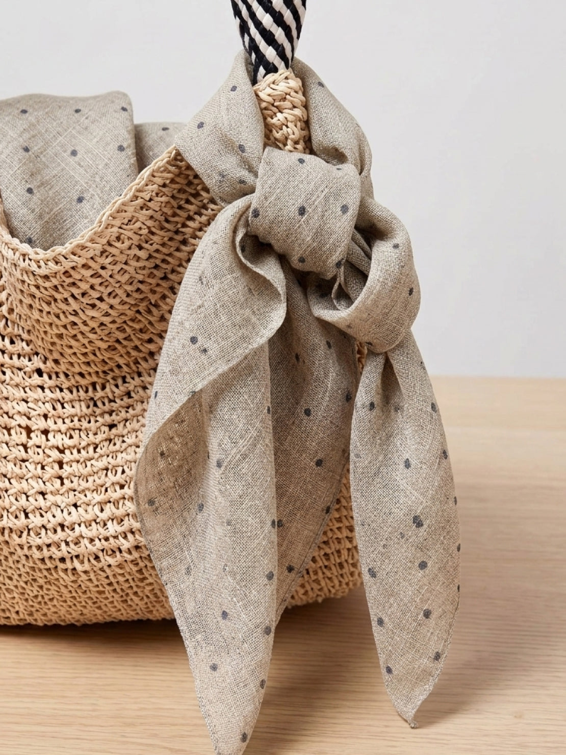 Lightweight 100% linen neck scarf with checkered pattern and natural rolled edges