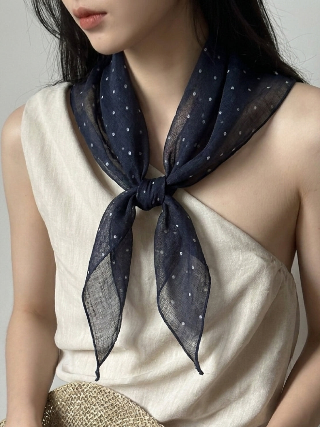Lightweight 100% linen neck scarf with timeless checkered pattern and natural rolled edges