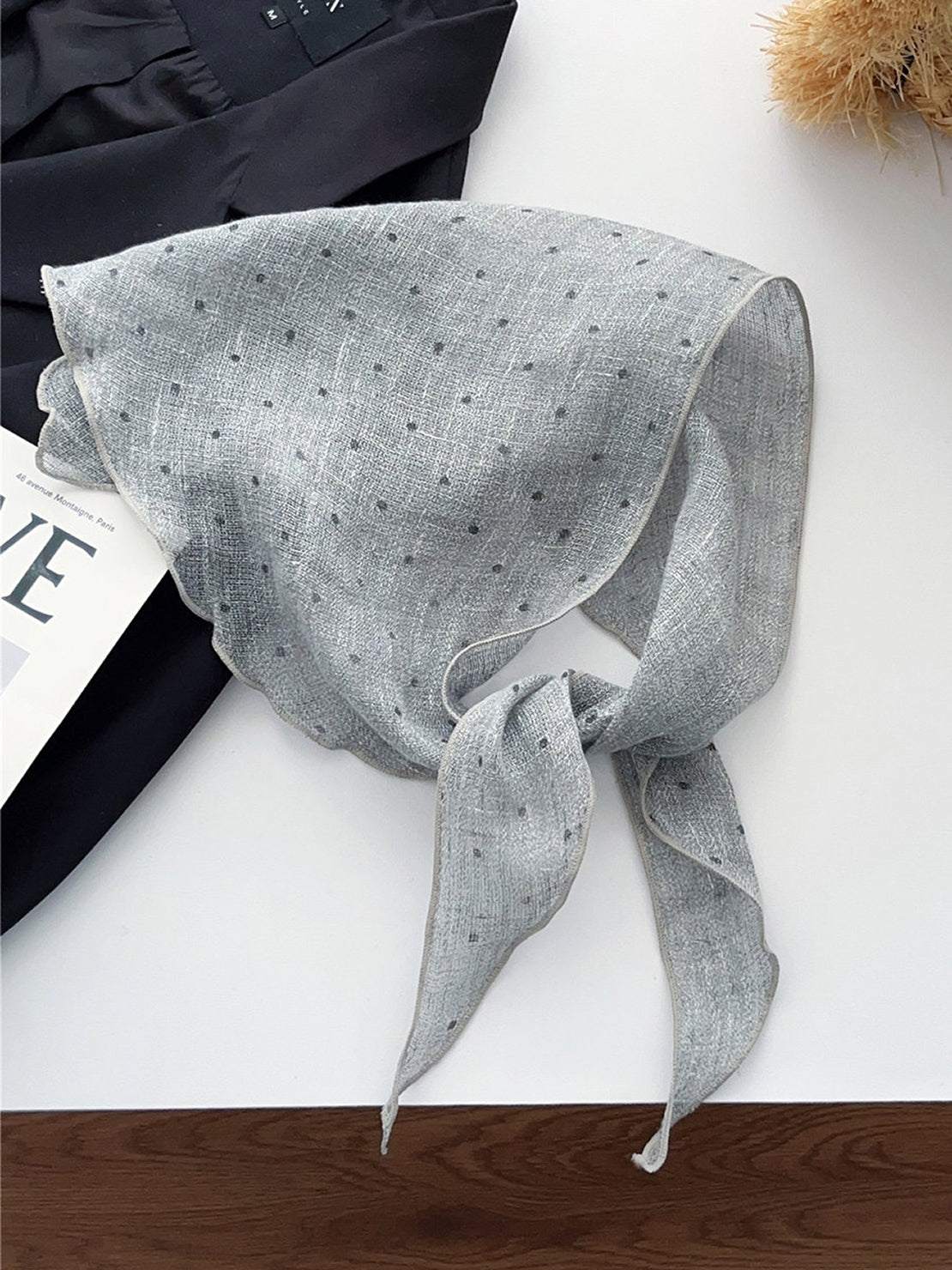 Lightweight 100% linen neck scarf with timeless checkered pattern and natural rolled edges