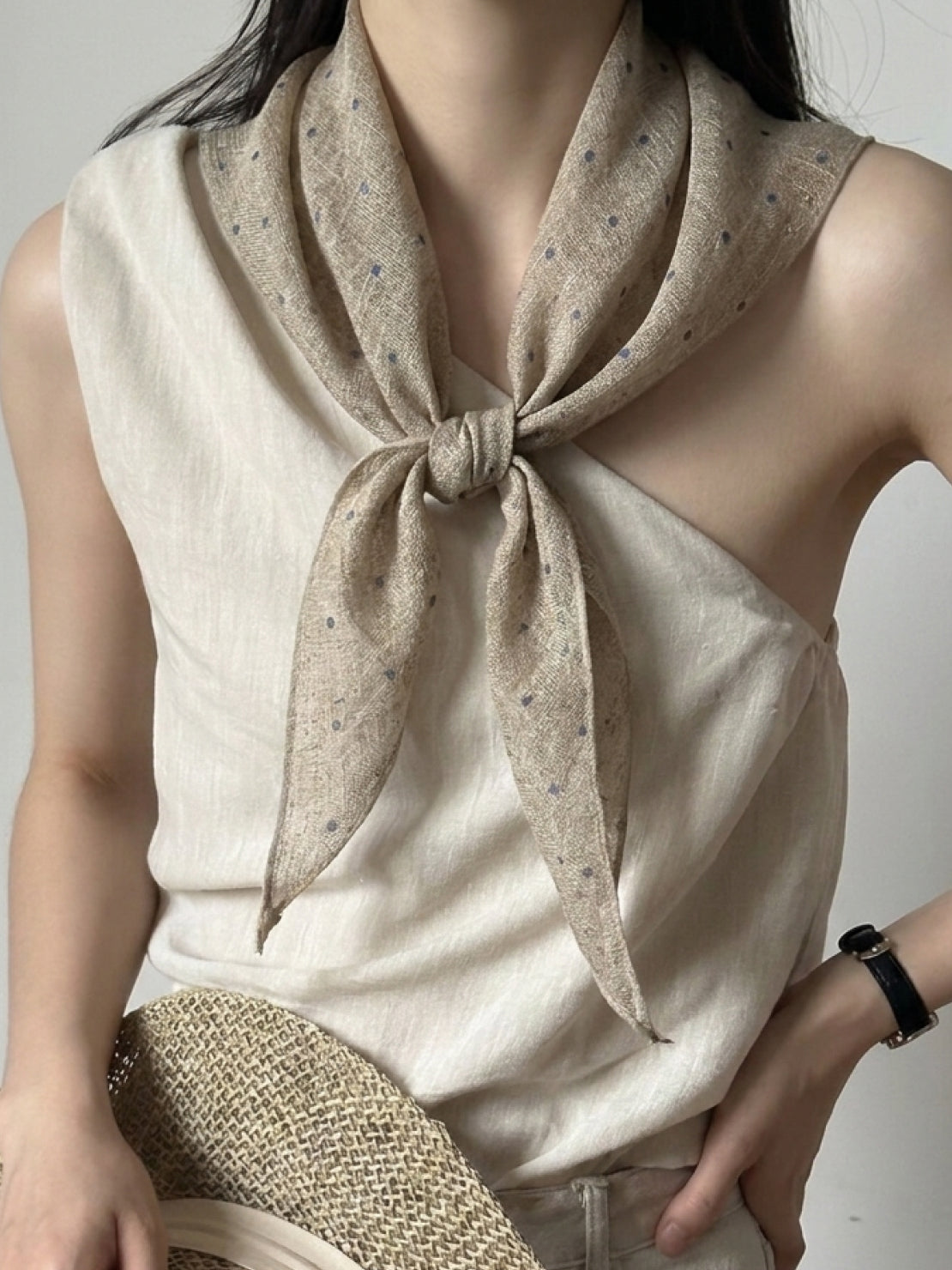 100% linen neck scarf with timeless checkered pattern, lightweight and breathable, styled around neck and bag