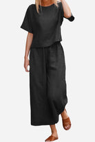 Women wearing Breezy Meadow Two-Piece Set with relaxed-fit top and wide-leg trousers in lightweight fabric