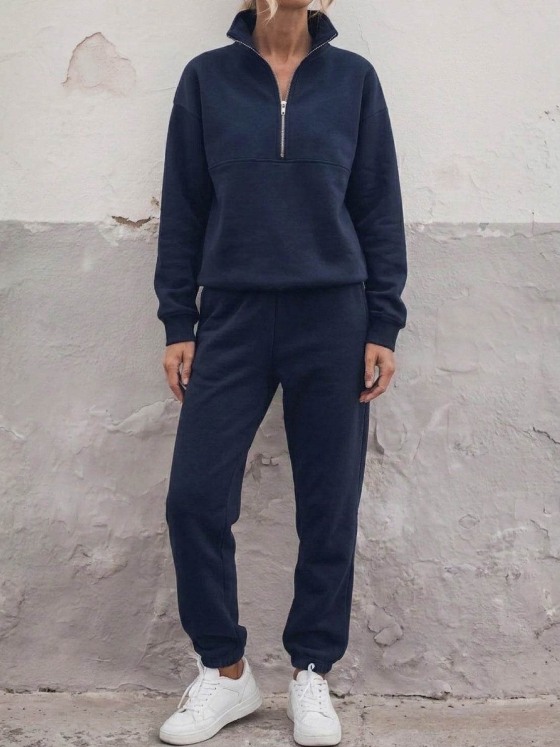 Cotton-blended two-piece tracksuit with high collar, zip front, relaxed fit, and straight-leg pants