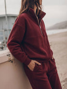 Cotton-blended two-piece tracksuit with high collar, zip front, and straight-leg pants