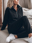 cotton-blended two-piece tracksuit with high collar zipper and relaxed fit pants