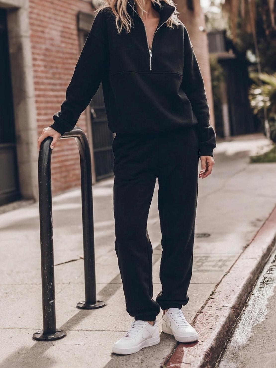 Cotton-blended two-piece tracksuit with high stand collar, zip front, relaxed sleeves, and straight-leg pants