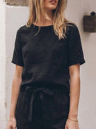 Cotton linen set with relaxed short-sleeve top and straight-leg pants in monochrome breathable fabric