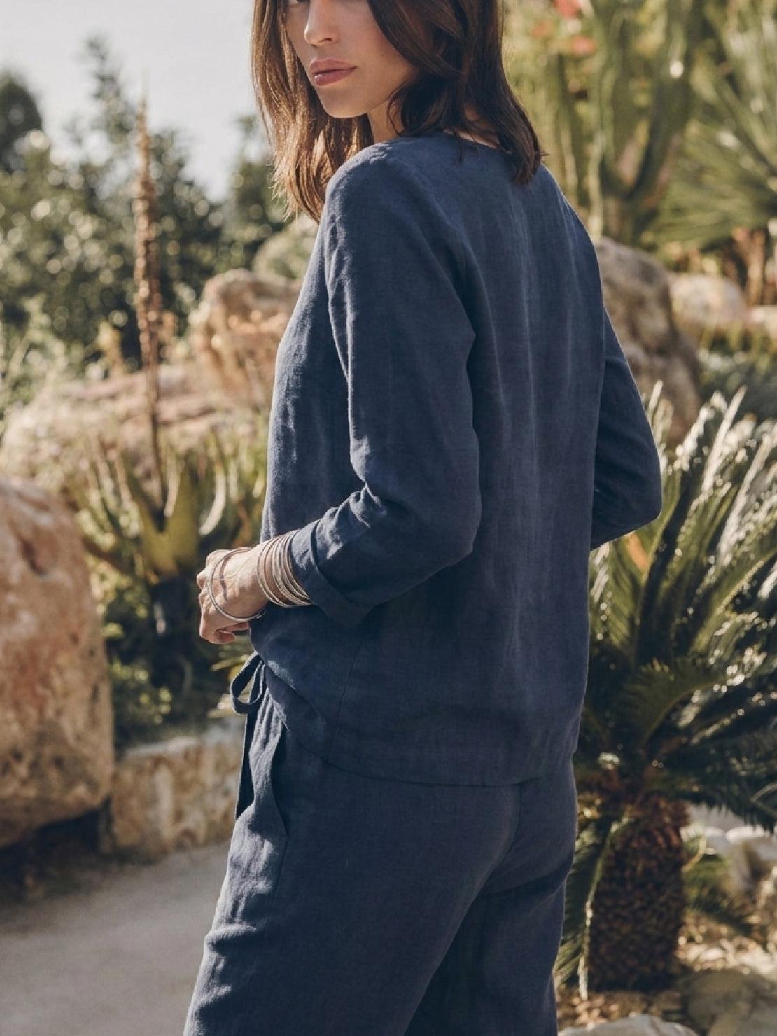 Woman wearing a cotton-linen monochrome longline top and wide-leg pants set