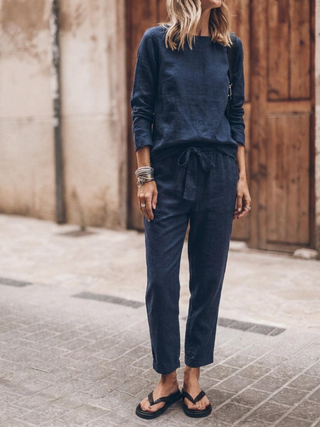 Model wearing cotton-linen monochrome relaxed longline top and wide-leg pants set