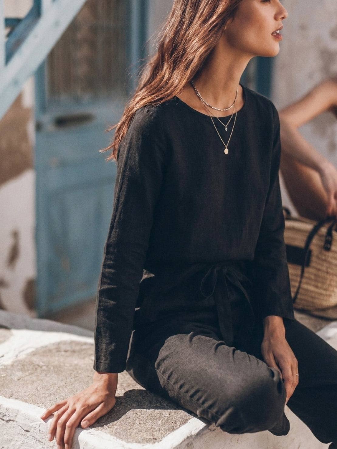 Model wearing relaxed cotton-linen monochrome longline top and wide-leg pants set