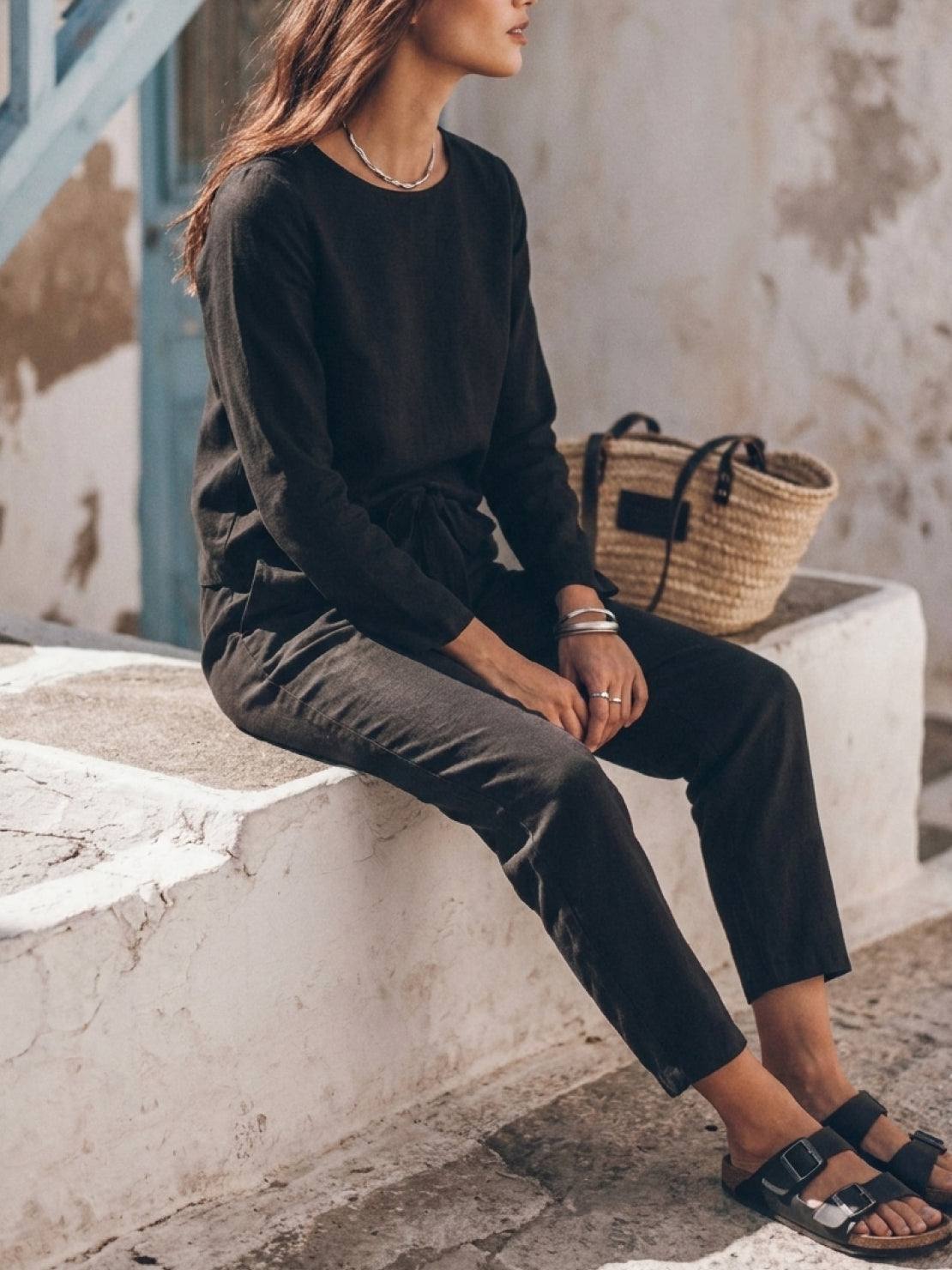 Woman wearing a relaxed cotton-linen monochrome longline top and wide-leg pants set