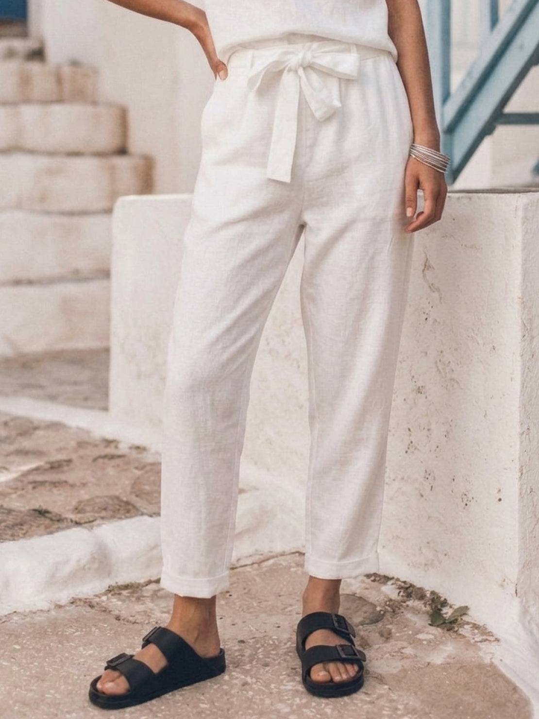 woman wearing cotton-linen monochrome relaxed longline top and wide-leg pants set