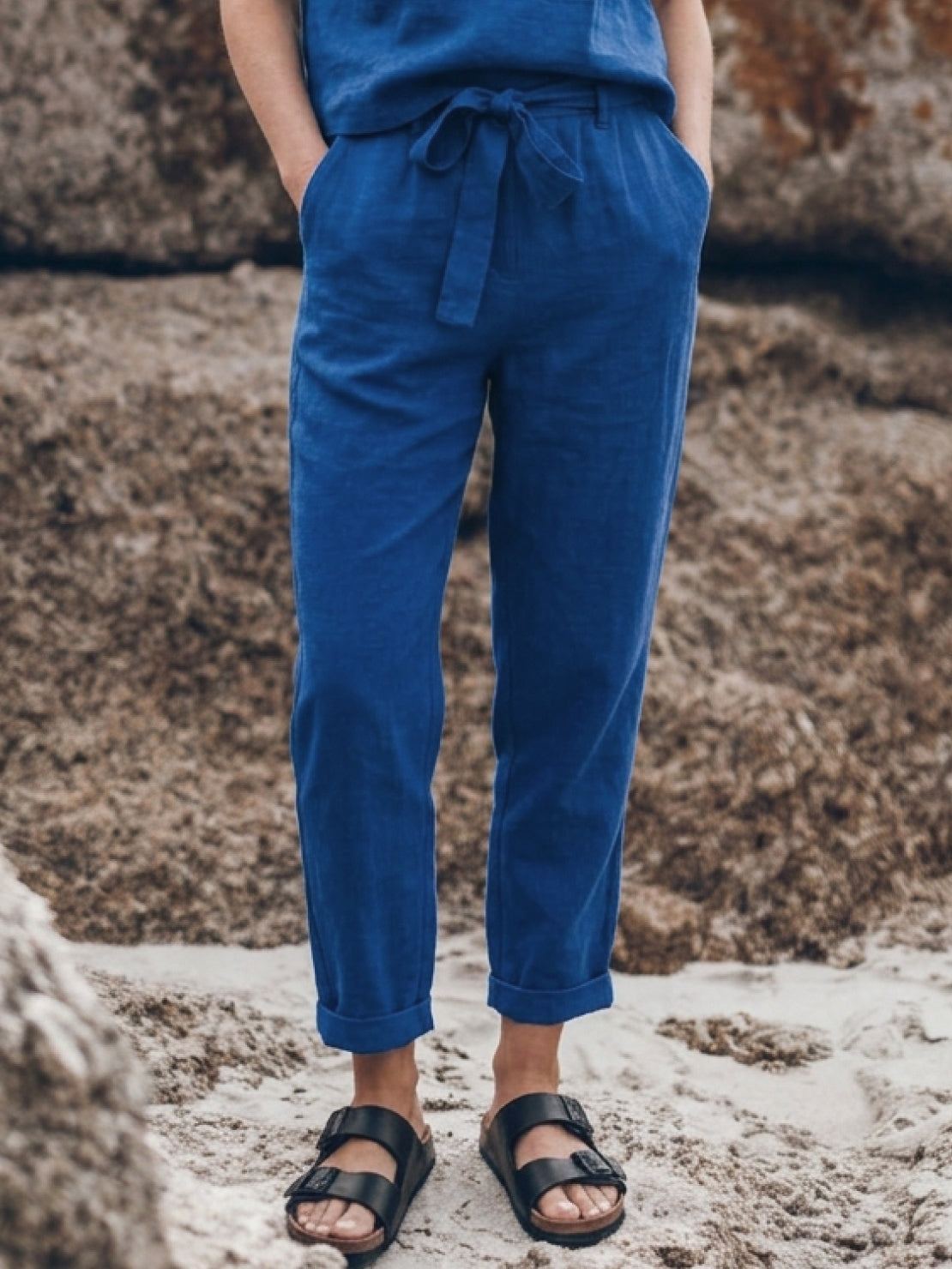 woman wearing cotton-linen monochrome relaxed longline top and wide-leg pants set