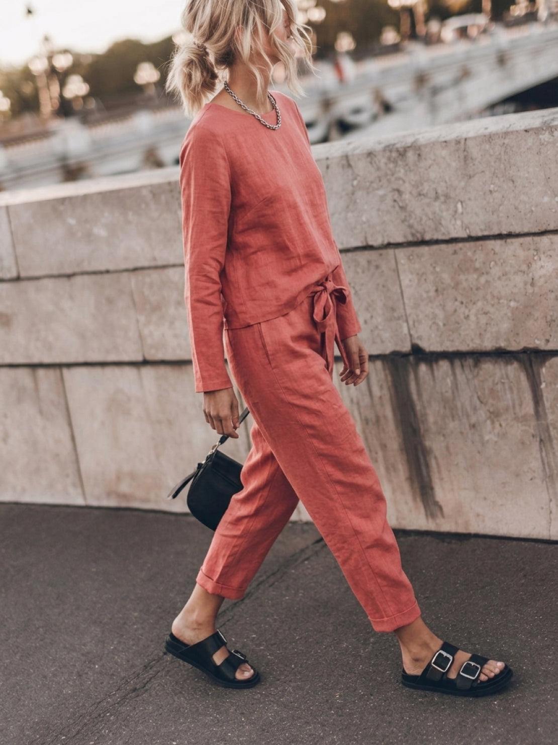 Woman wearing cotton-linen monochrome relaxed longline top and wide-leg pants set