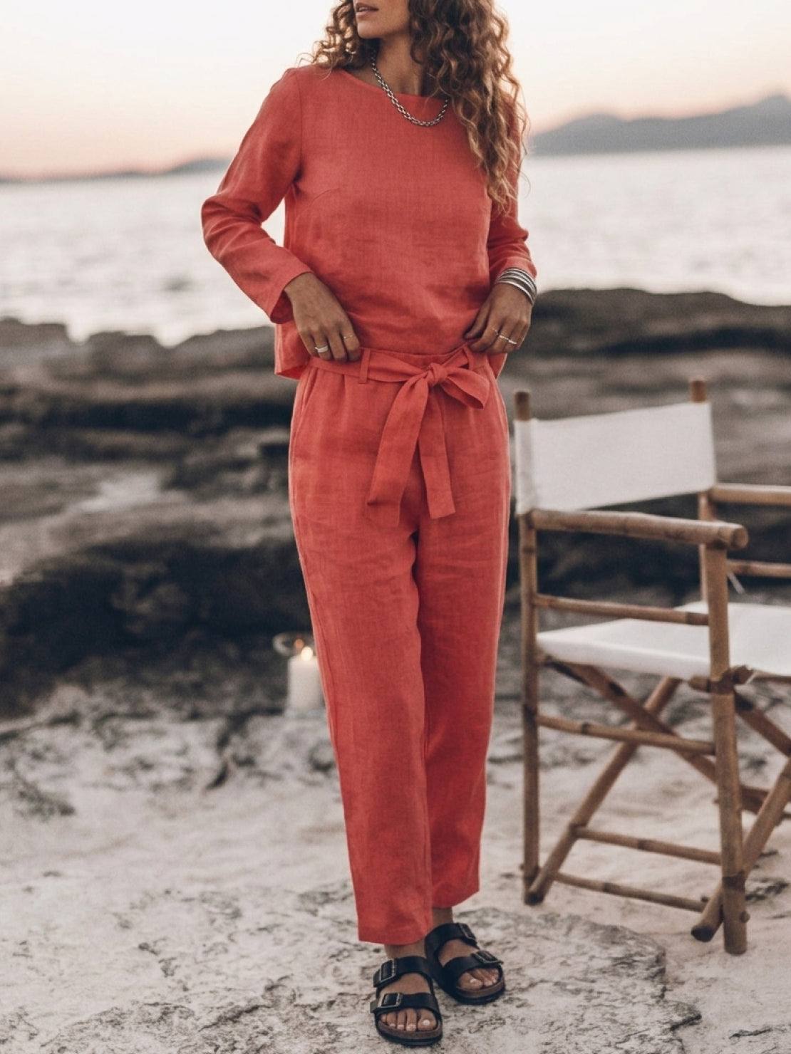 Woman wearing cotton-linen monochrome relaxed longline top and wide-leg pants set