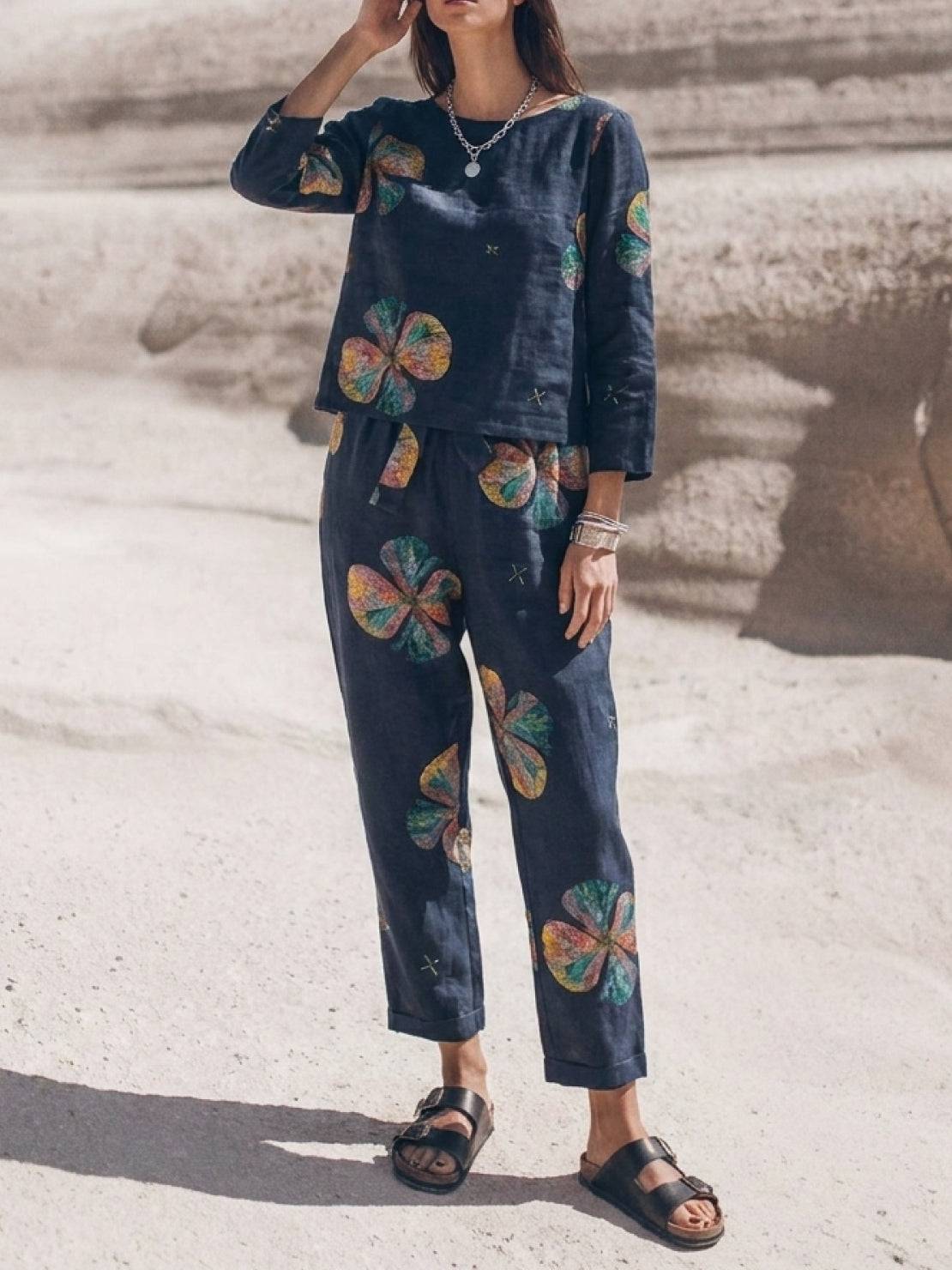 woman wearing cotton-linen monochrome relaxed longline top and wide-leg pants set