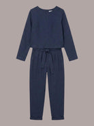 Woman wearing relaxed cotton-linen monochrome longline top and wide-leg pants set