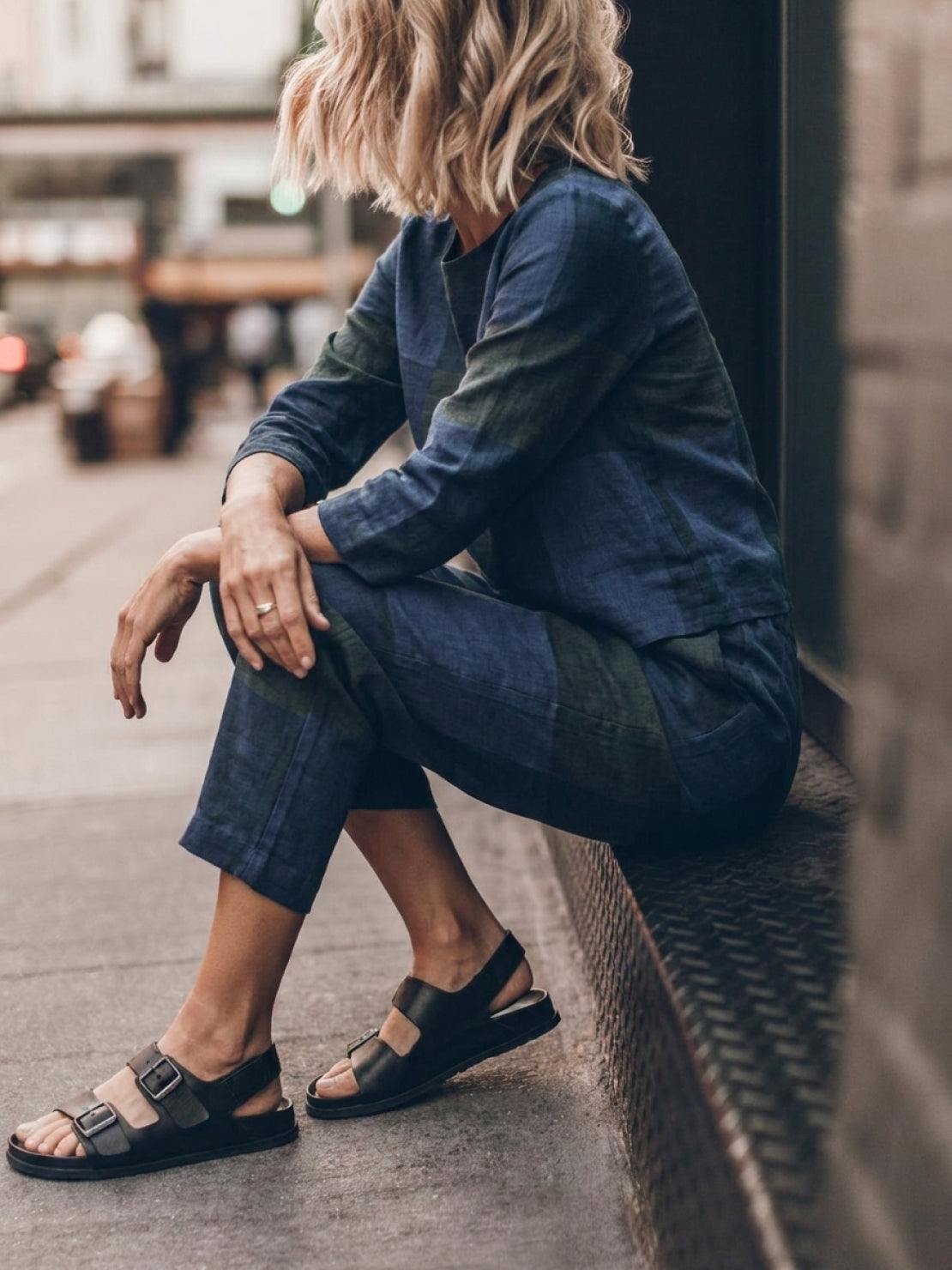 Woman wearing cotton-linen monochrome relaxed longline top and wide-leg pants set