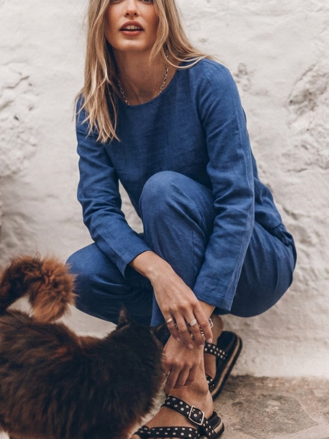Woman wearing a relaxed cotton-linen monochrome longline top and wide-leg pants set