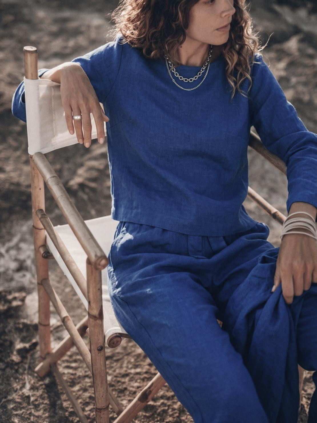 Woman wearing cotton-linen monochrome relaxed longline top and wide-leg pants set
