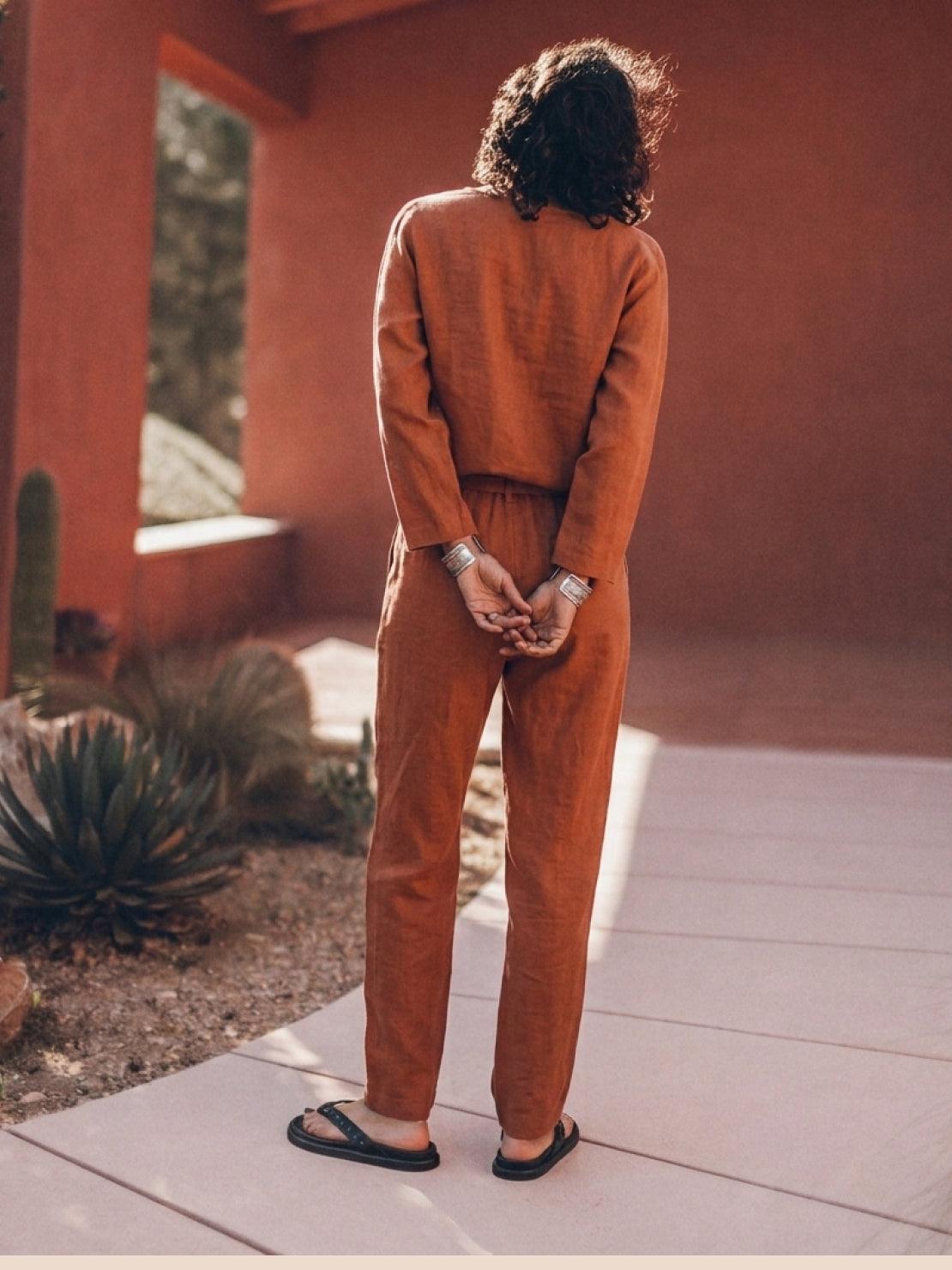 Woman wearing cotton-linen monochrome longline top and wide-leg pants set in relaxed fit