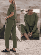 model wearing relaxed cotton-linen set with short-sleeve top and straight-leg pants in monochrome tones