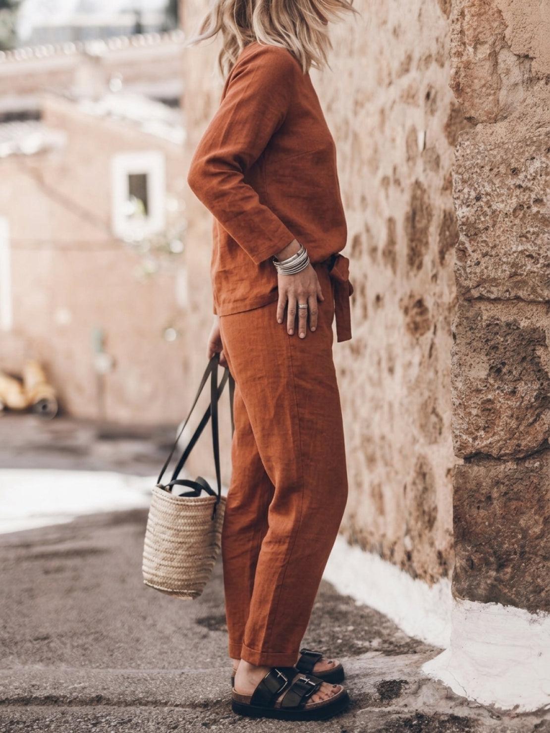 Model wearing cotton-linen monochrome relaxed longline top and wide-leg pants set