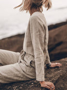 Woman wearing cotton-linen monochrome relaxed longline top and wide-leg pants set