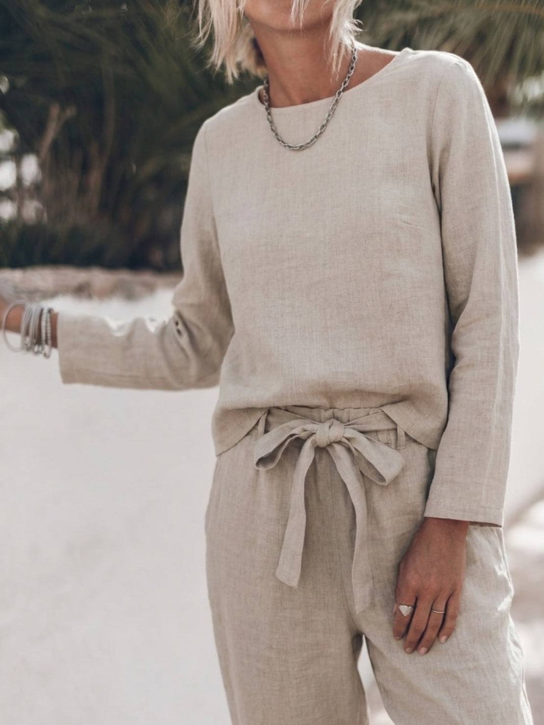 Woman wearing cotton-linen monochrome relaxed longline top and wide-leg pants set