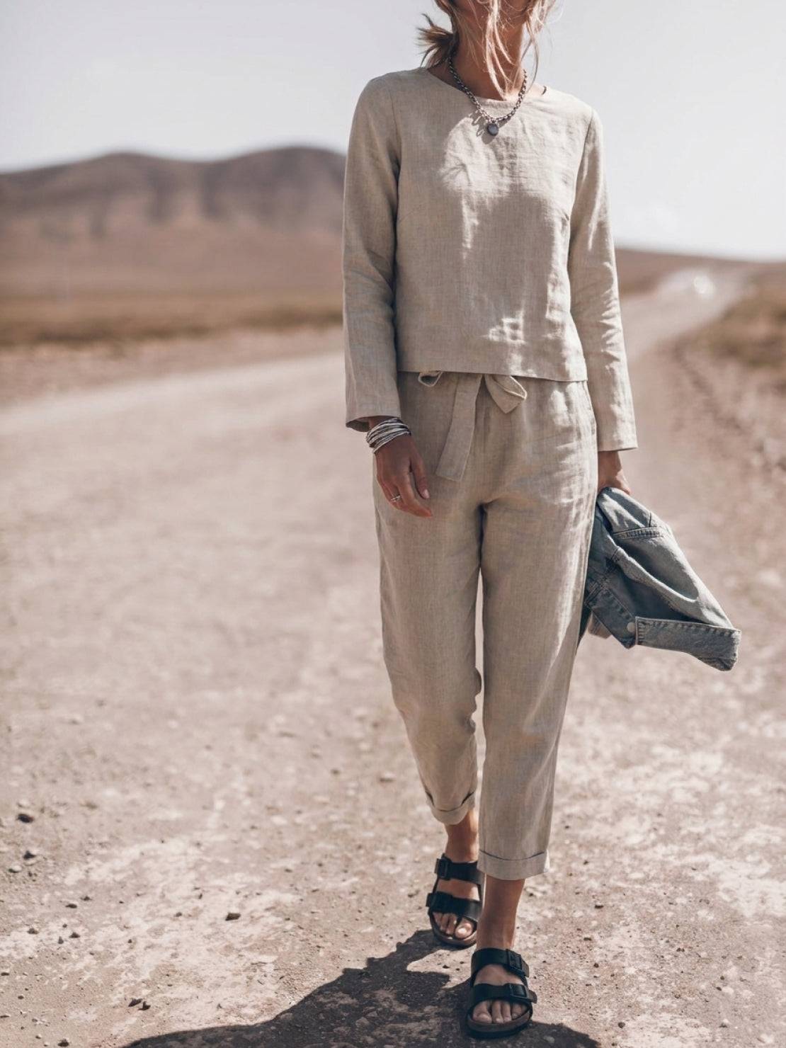 Woman wearing cotton-linen monochrome relaxed longline top and wide-leg pants set