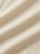 100% linen rolled cuff tee with relaxed scoop neckline and contrast inner lining