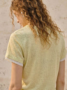 100% linen rolled cuff tee with relaxed scoop neckline and contrast inner lining