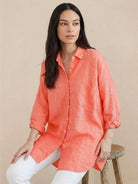 Oversized linen shirt with relaxed fit and breathable cotton-linen blend in soft sun-washed texture