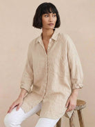 oversized linen shirt in soft breathable cotton blend with relaxed fit and gathered back pleats