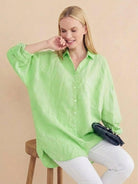 Oversized linen shirt in breathable cotton-linen blend with relaxed fit and back pleat detailing