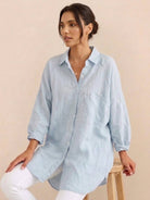 Oversized linen shirt in soft cotton-linen blend with relaxed fit and button back detail