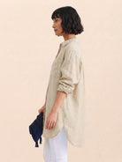 Oversized linen shirt in soft cotton blend with relaxed fit and gathered back pleats