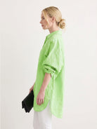 Oversized linen shirt in soft sun-washed cotton-linen blend with relaxed fit and button back detailing