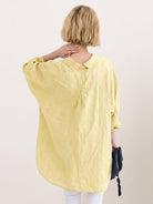 Oversized linen shirt in soft cotton-linen blend with relaxed fit and gathered back pleats