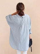 Oversized linen shirt in soft cotton-linen blend with relaxed fit and gathered back pleats