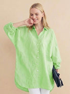 Oversized linen shirt in soft cotton-linen blend with relaxed fit and gathered back pleats