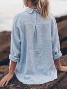 relaxed oversized 100% cotton linen shirt with dropped shoulders and signature back pleat detail