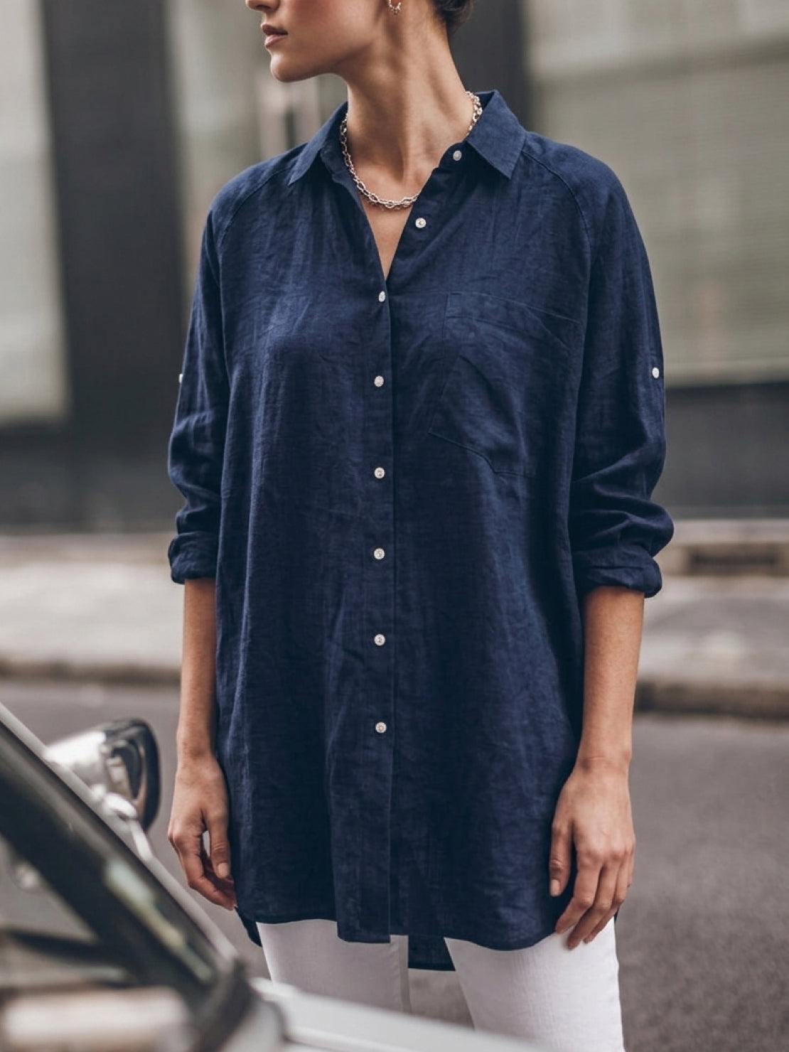 relaxed oversized 100% cotton linen shirt with dropped shoulders and back pleat detail on white background