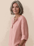 white pure linen age-defying shirt with button details on a hanger