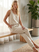 woman wearing relaxed chic elastic ankles pants in casual stylish pose