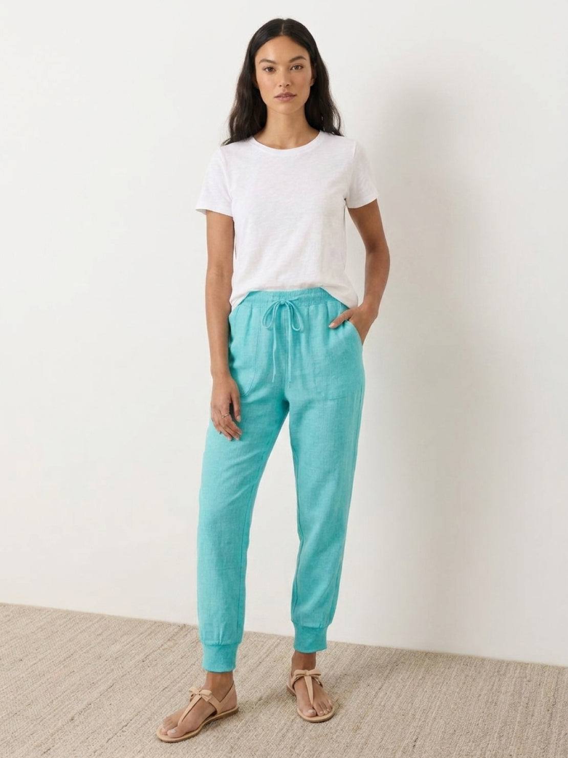 Women wearing relaxed chic elastic ankles pants in casual and stylish settings