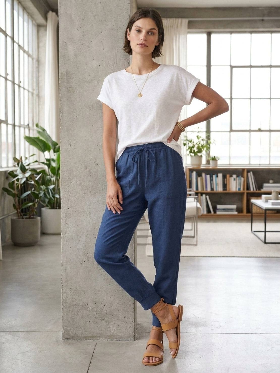Woman wearing relaxed chic elastic ankles pants in casual stylish outfit, showcasing comfortable fit and elastic cuffs